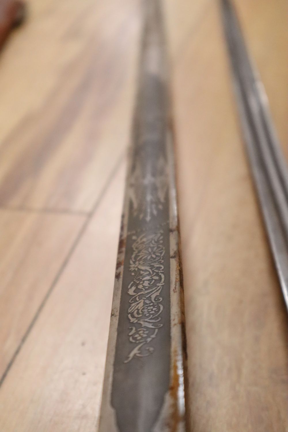 An 1822 pattern officers infantry sword, a Prussian officers sword and a court sword